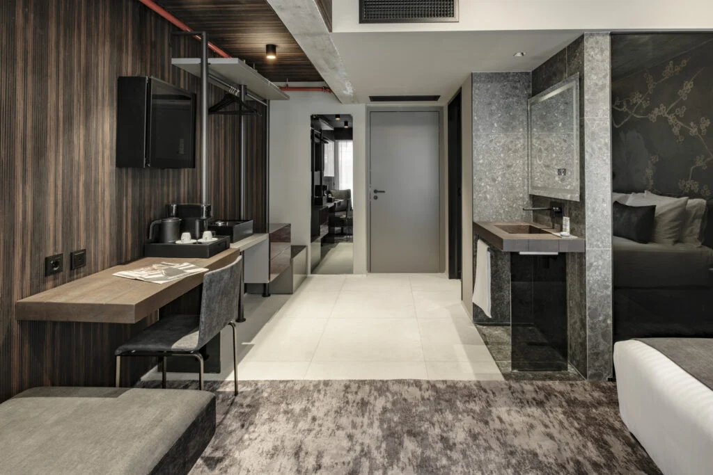 Spacious hotel suite hallway and modern desk area - Fitch Hotel Spacious hotel suite hallway and modern desk area - Fitch Hotel
