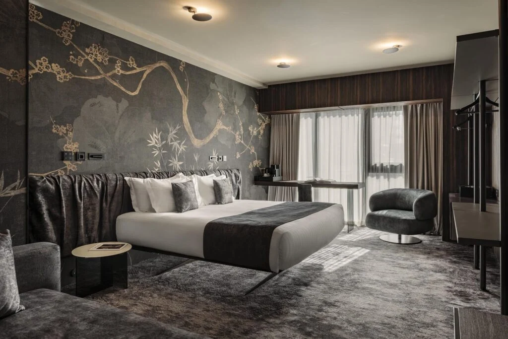 fitchhotel_superiorsuite00003 Modern hotel suite with bed - Fitch Hotel